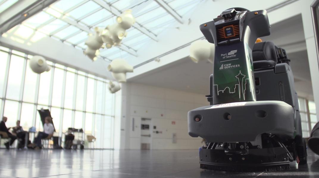 Floor cleaning robot at Sea-Tac.