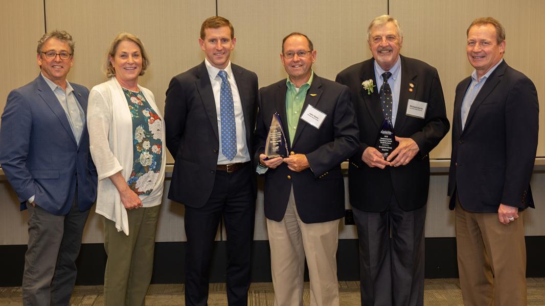 Port Executives and Commissioners with Whidbey Seatac Shuttle and Bremerton Kitsap Shuttle representatives.