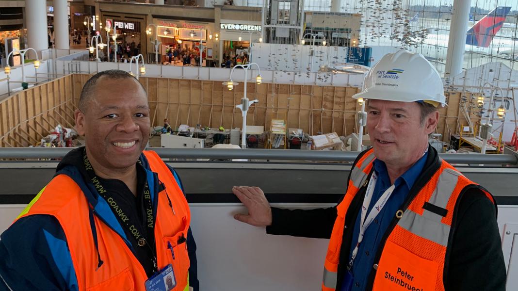Bradley Benson and Commissioner Steinbrueck overlook the Central Terminal.