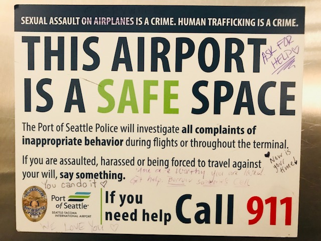Safe space signage in SEA bathrooms.
