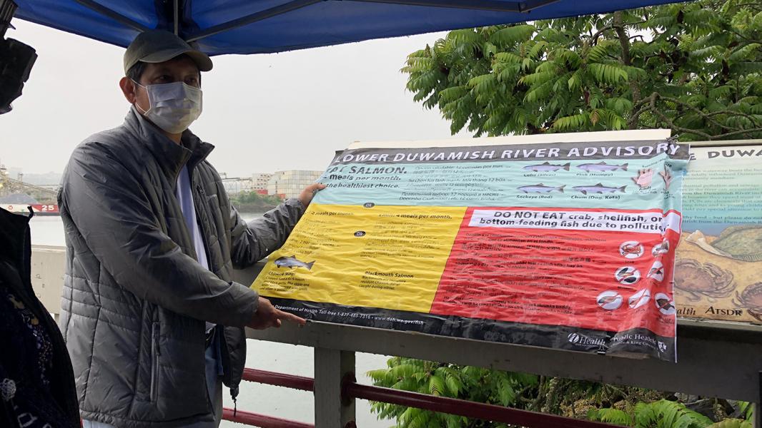 Rolling out new fish advisory signage.