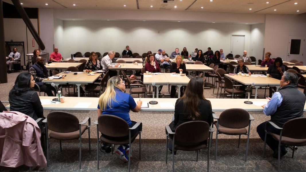 2019 PortGen event with panel and attendees.
