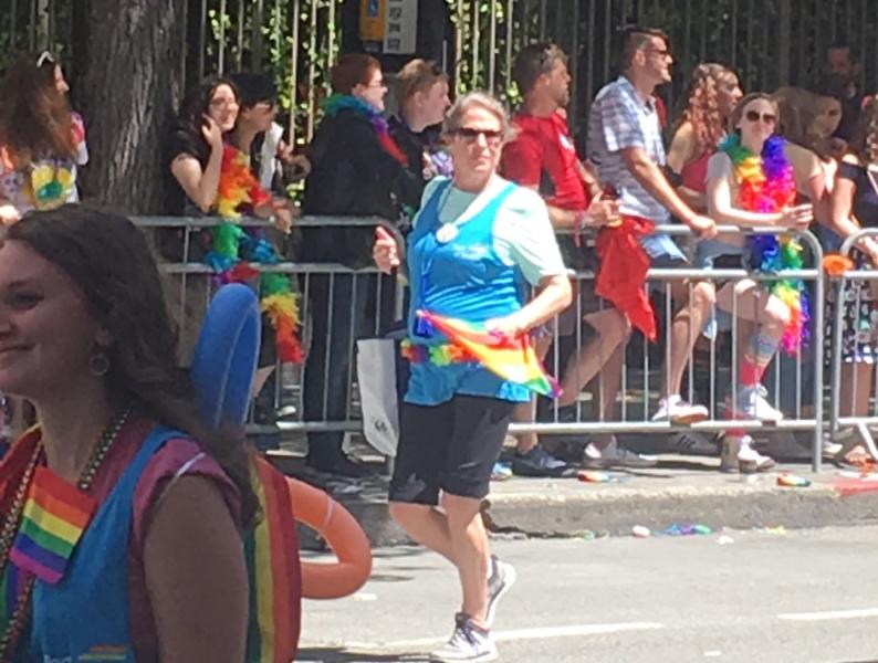 Elizabeth Leavitt participates at a pride parade.