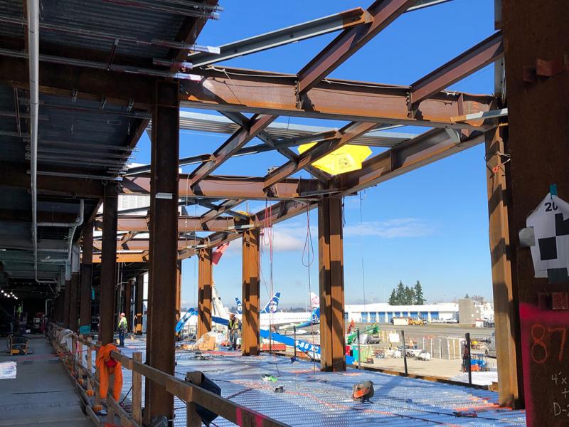 Photo of the new steel moment frame tying in with the existing structural steel.