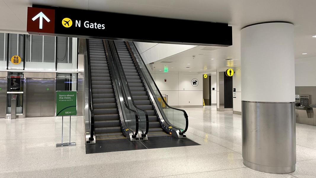 North Satellite train station level with efficient lighting.