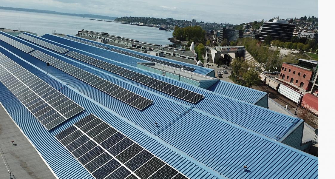 Completed array of solar panels on the roof of Port headquarters at Pier 69, overlooking the waterfront.