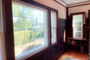 Indoor view of a window in a home that has received sound-proofing barriers.