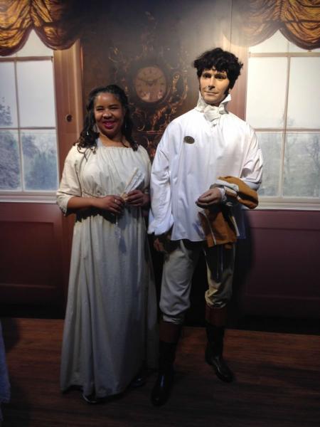LaTonja with Mr. Darcy wax figure, from Jane Austen Novel.