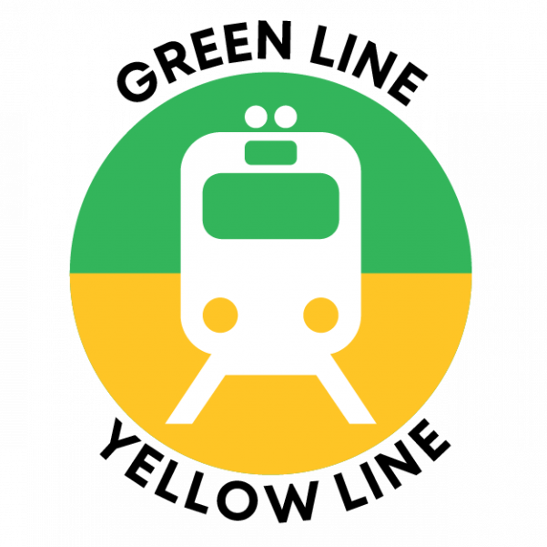 Circular icon split horizontally with a green top half and yellow bottom half, featuring a simplified white front‑view train symbol in the center. The words ‘GREEN LINE’ curve above the circle and ‘YELLOW LINE’ curve below.