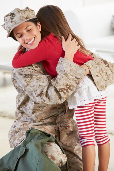Meeting service member at the gate.