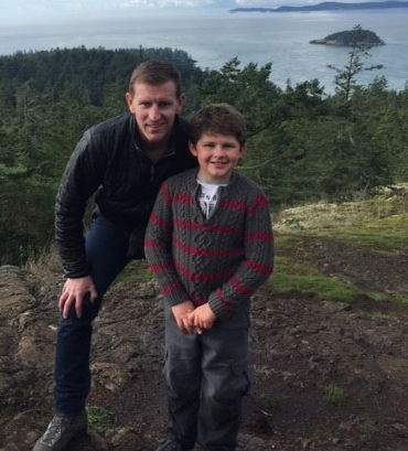 Commissioner Calkins and his son.