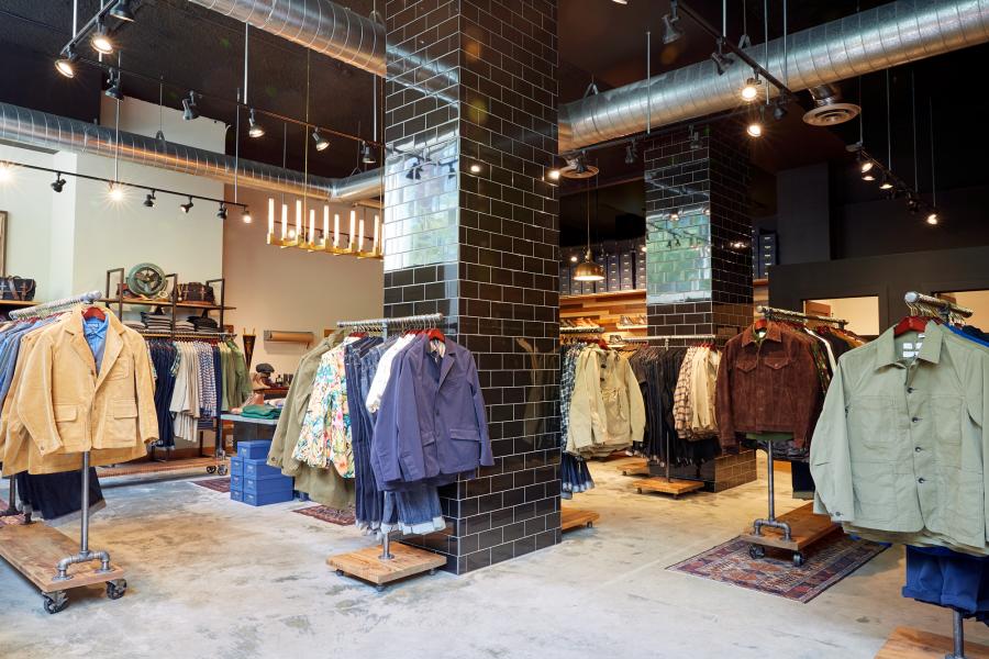 A clothing store with jackets and blazers.