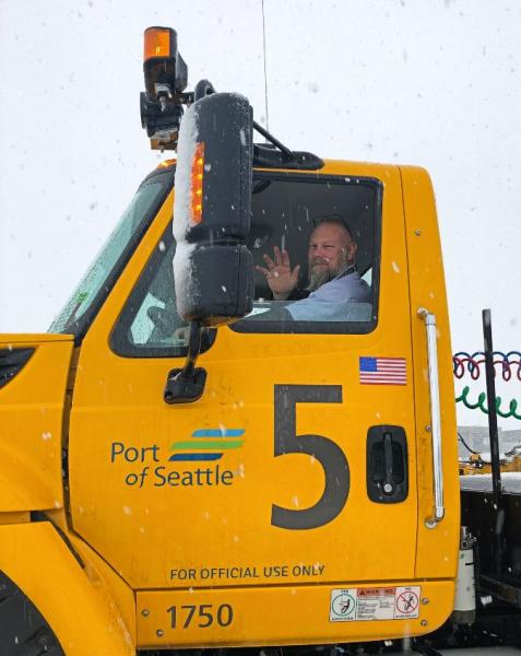 Snow plow driver at SEA airport.