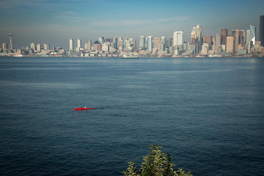 Seattle skyline with kayaker in the front.