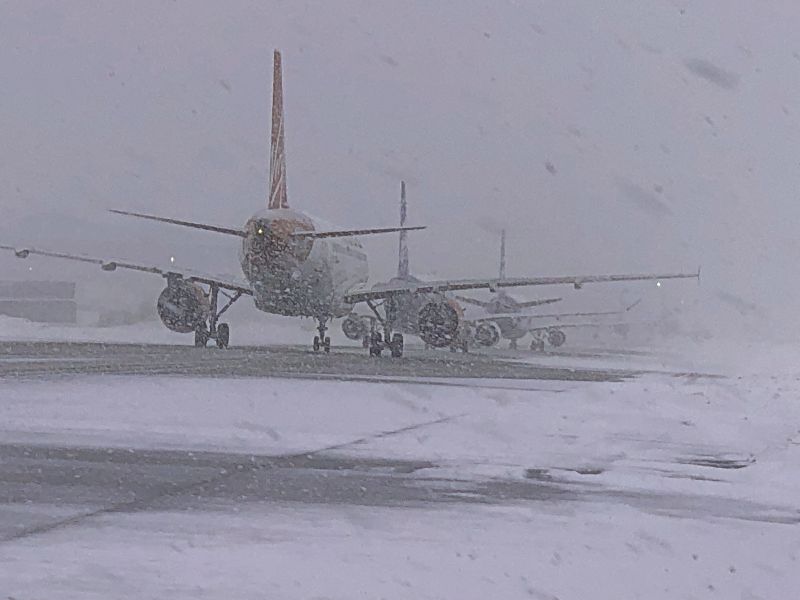 Planes operating in a snowstorm.