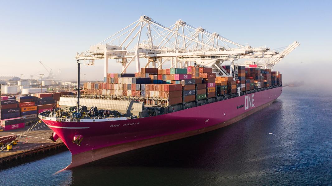 Large container ship arrives at Port of Seattle terminal.
