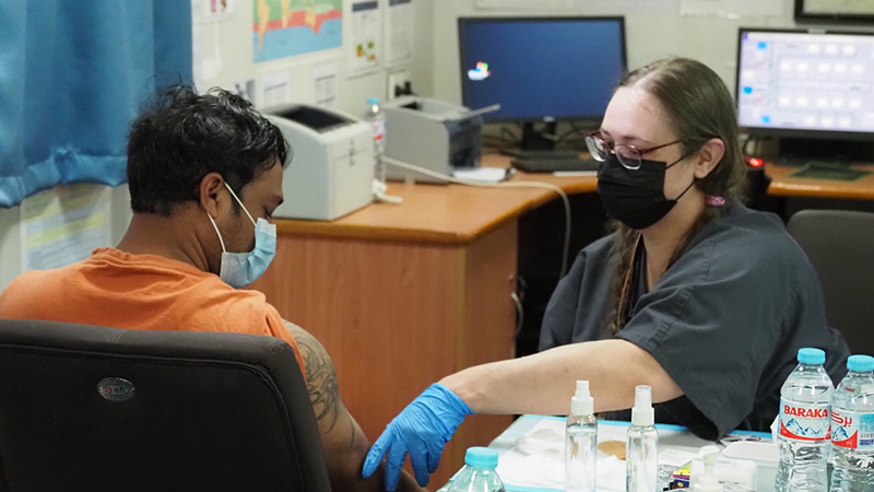 Crew getting vaccinated.