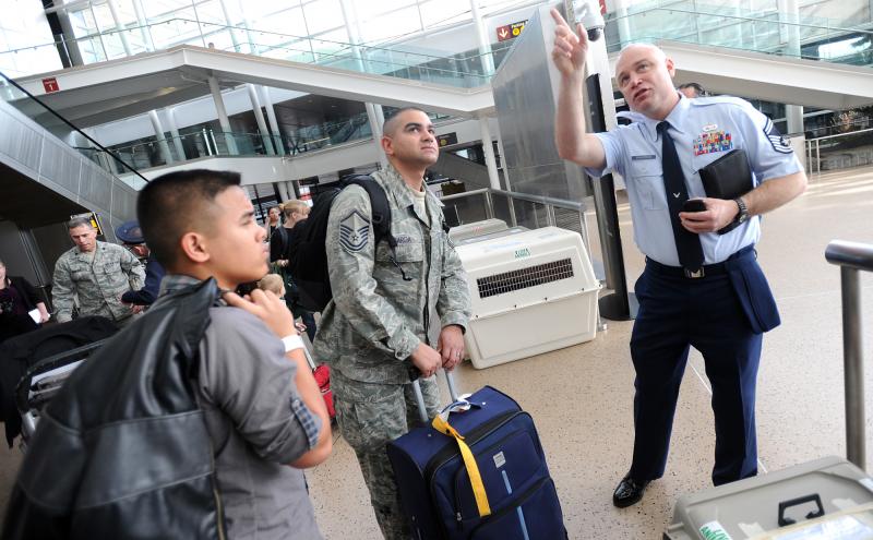 Military member at SEA airport.