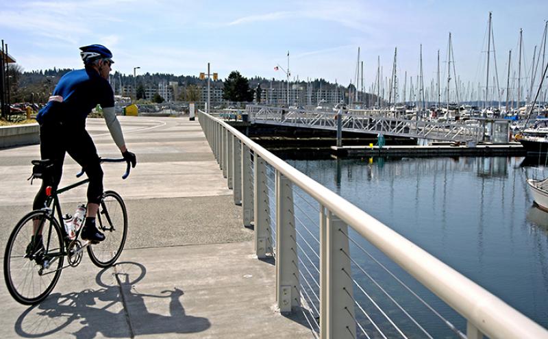 Bicyclist at Shilshole Bay Marina.