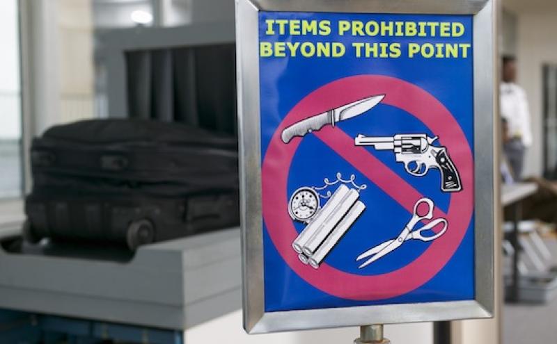 Items Prohibited Beyond this point,  knives, guns, scissors, and explosives. 