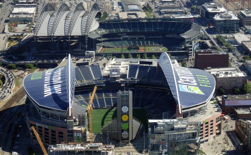 Aerial view of CenturyLink train tracks buildings roads and Safeco Field in Seattle in June 25 2016. Home of the Seattle Seahawks (NFL) Mariners (MLB) and Sounders (MLS). Stock Photo ID: 202233658 Copyright: EricBVD