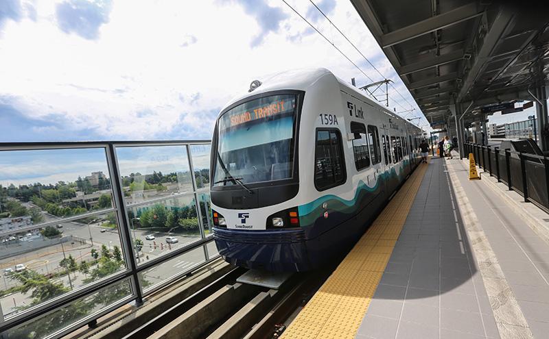 Mass transit train pulls into Seattle-Tacoma Airport Station.