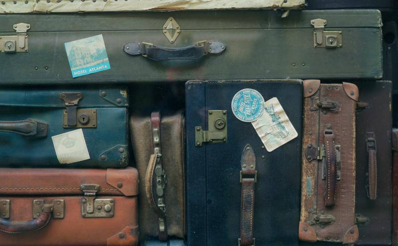 Pile of vintage luggage.