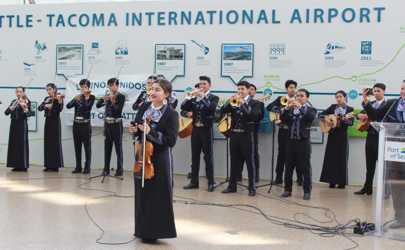 Latino band plays at Sea-Tac Airport.