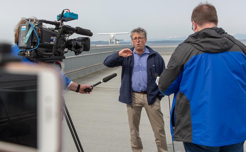 Commissioner Felleman speaks to the press about the Pier 69 solar panel project, Seattle, April 25, 2019
