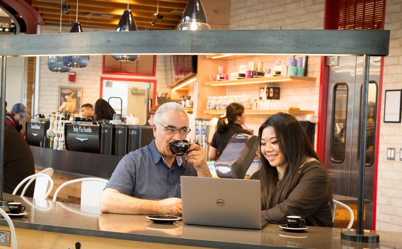 Customers enjoy a coffee at Cafe D'Arte, a new eatery in the modernized North Satellite at Seattle-Tacoma International Airport, March, 2019