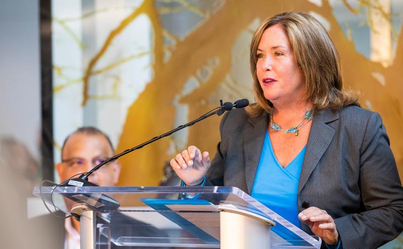 Port Commission president Stephanie Bowman addresses attendees at a reception marking the opening of the first phase of the North Satellite Modernization project at Sea-Tac Airport, July 11, 2019