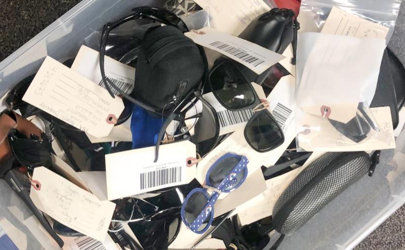 Pile of sunglasses at Lost and Found.