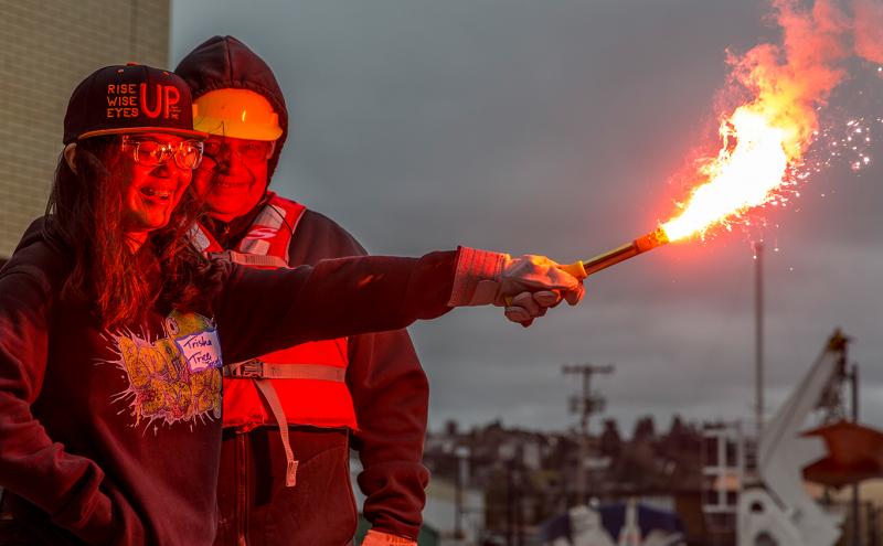 Student learns about using a flare at the youth maritime expo, March 2018