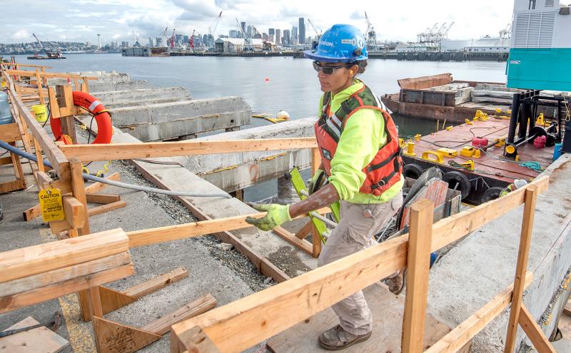 Construction worker on Terminal 5 modernization project to make the terminal "big ship ready", July 2019, Seattle