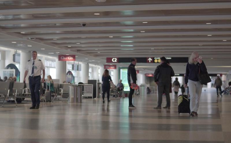 Terminal at SEA Airport with very few travelers during the COVID pandemic