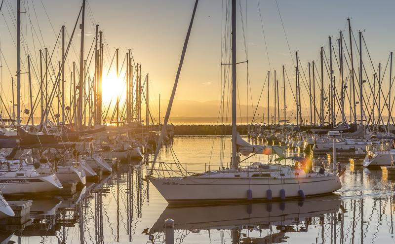 Sunset at Shilshole Bay with sailboats at the docks, Seattle, August 2015