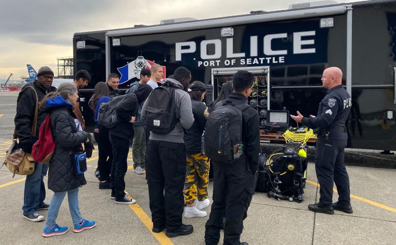 Demo of police officers with members of the community.