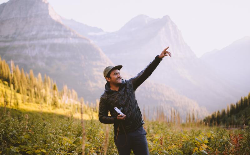 A man at a mountaintop view.