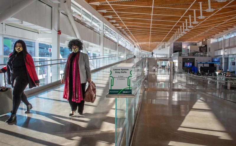 Diverse passengers at the airport.