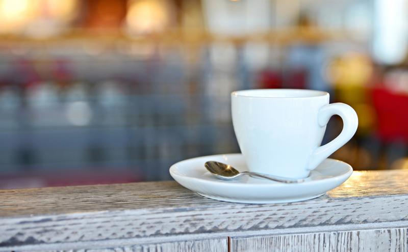 Coffee mug and saucer.