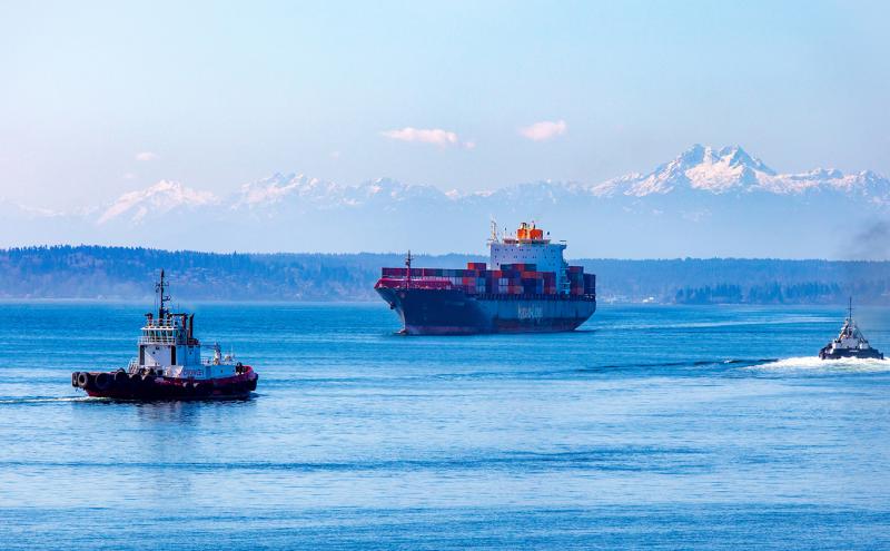 A cargo ship sails on the Puget Sound.