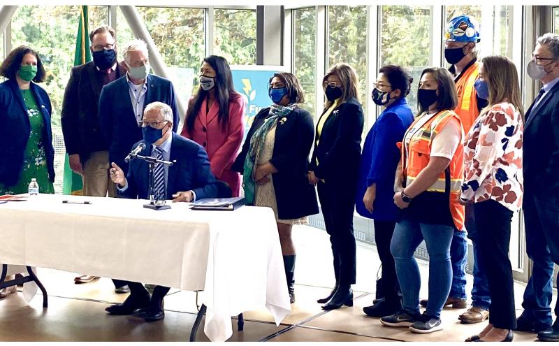 Governor Jay Inslee of Washington state signs bill in Olympia on May 17 2021