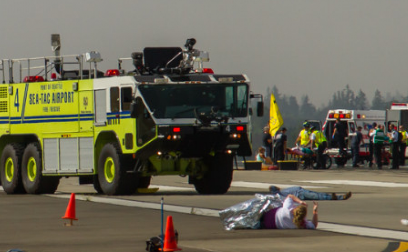 SEA fire truck and personnel exercise emergency response on the airfield.