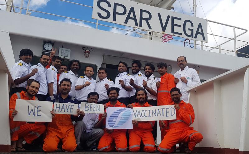 Vaccinated crew photo on the spar vargas.