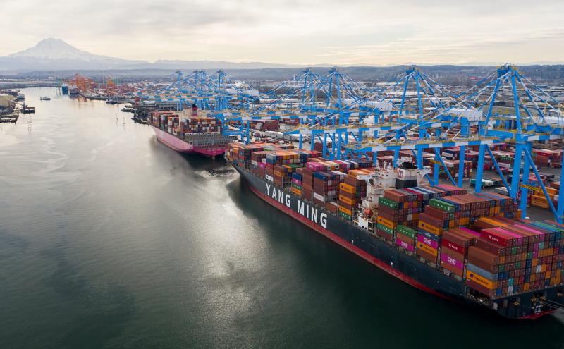 All eight new cranes work two ships for the first time at Husky Terminal in Tacoma.