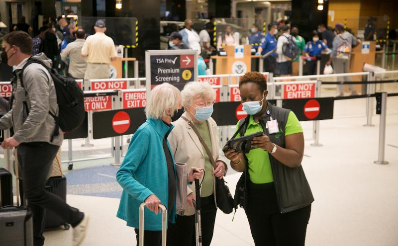 Pathfinder helps elderly women wearing masks.