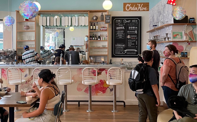 Shug's customers gather together