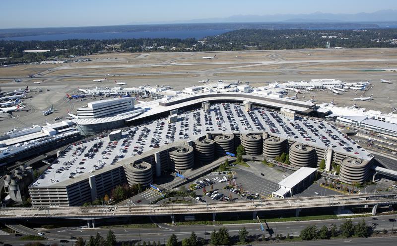 Aerial view of SEA Airport from the west with Puget Sound in the background