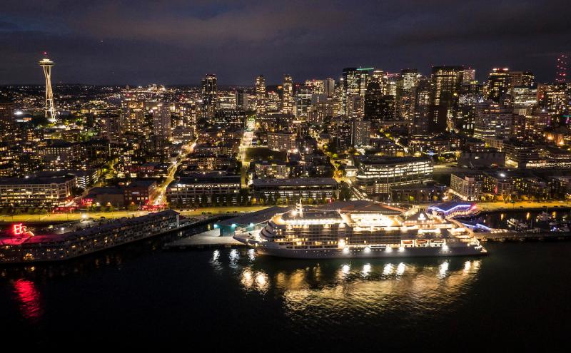 Lights on cruise ship and the City at night.
