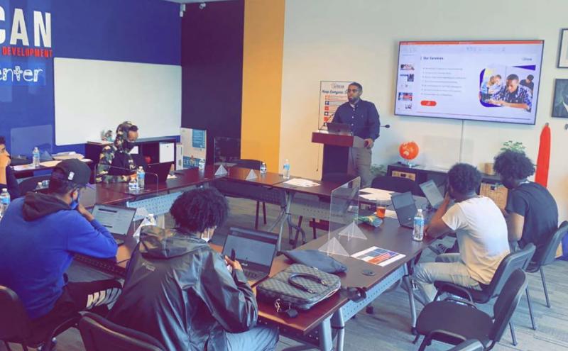 Daud Ali teaches a job readiness class at ACHD.